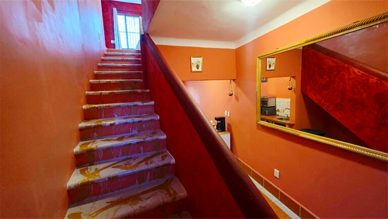 Efrain bottom of stairs mirror la joya escondita